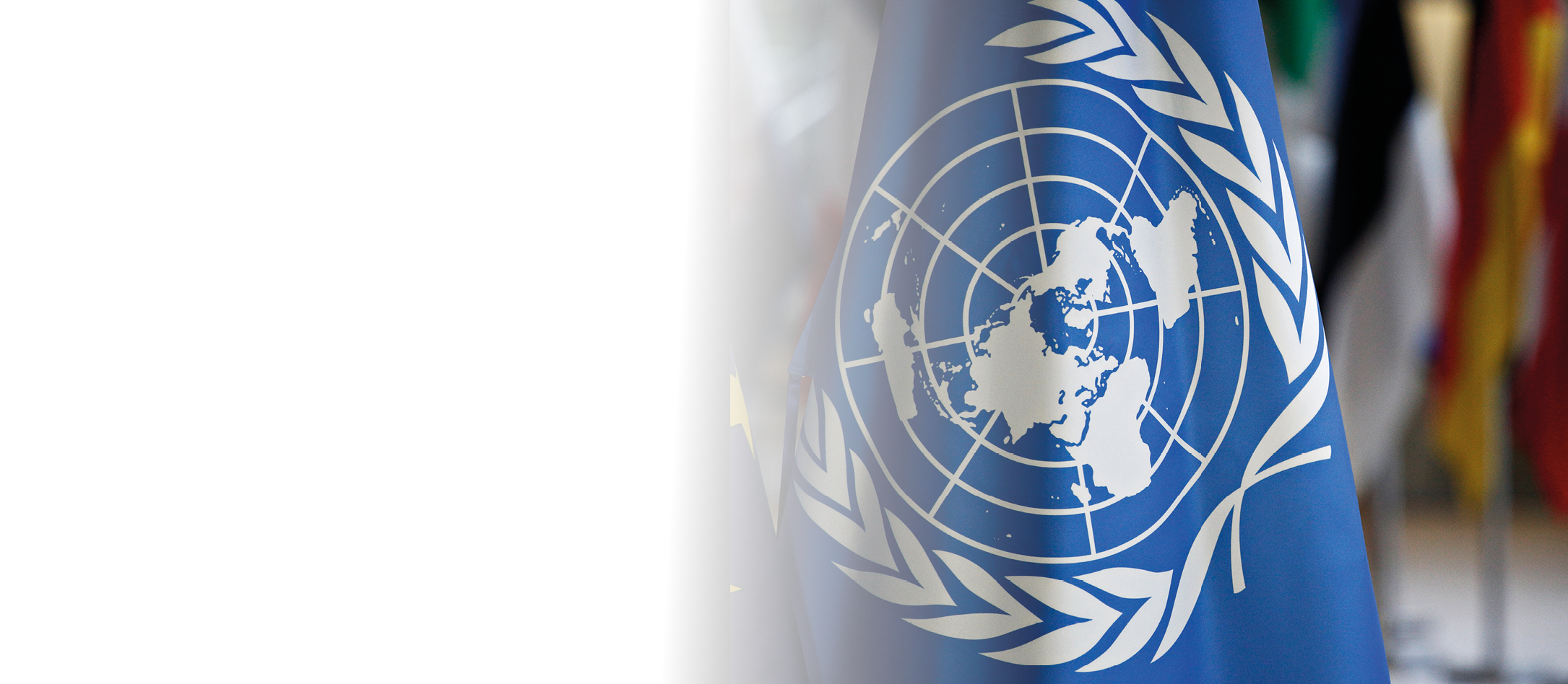 Brussels, Belgium, 15 May 2018.Flags of UN and EU stand in European council Building.