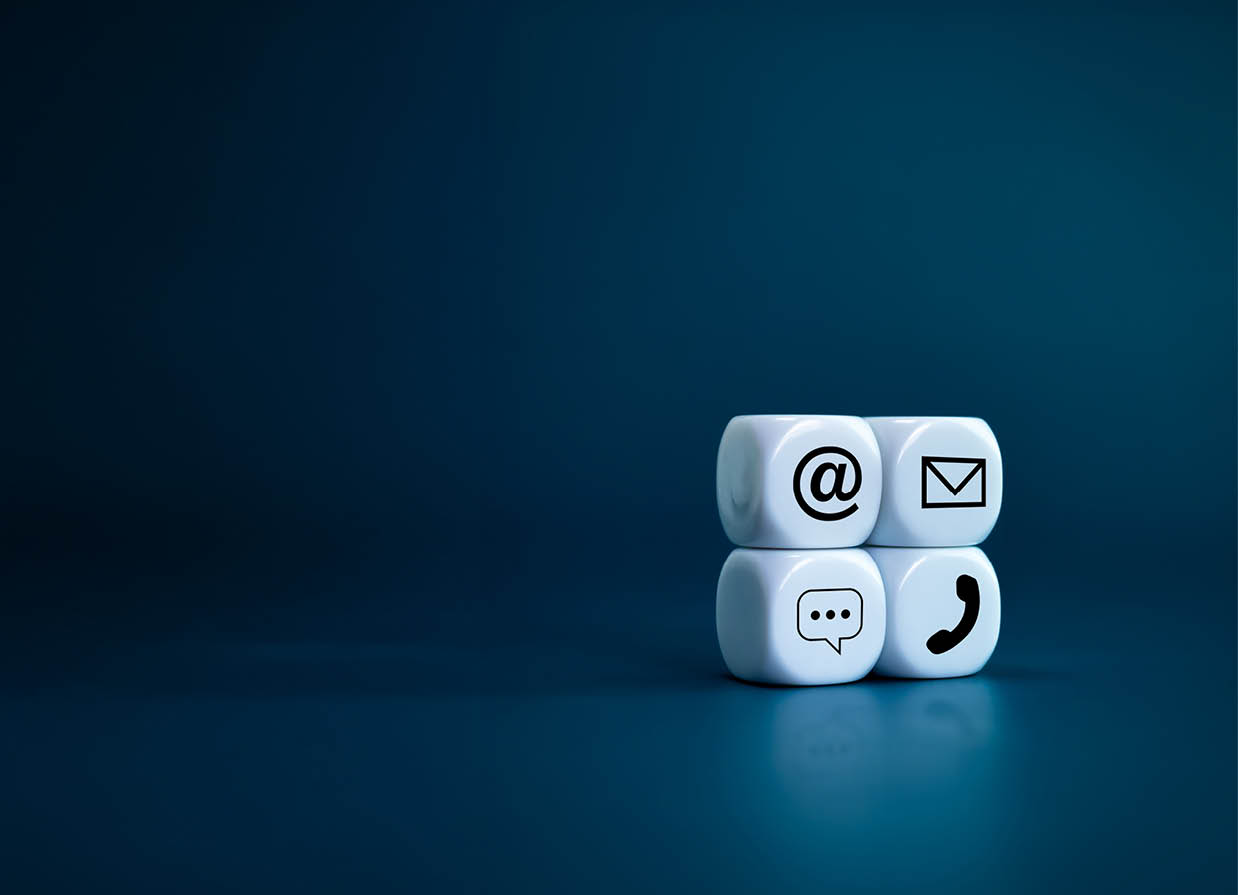 Contact us concept. Company website, FAQ, hotline phone number call, address, e-mail marketing and chat for customer support . Contact us icons on white cube blocks on blue background, vertical style.