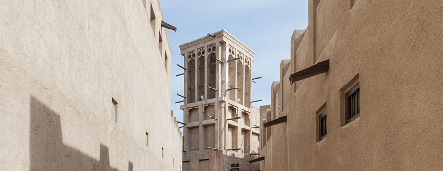 DUBAI, UAE - DECEMBER 16, 2014: A traditional windtower or barjeel in the Al Fahidi Historical Neighbourhood, also known as Al Bastakiya, in Dubai, United Arab Emirates. 